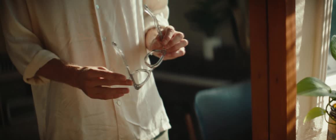 A footage of a man wearing an eyeglass