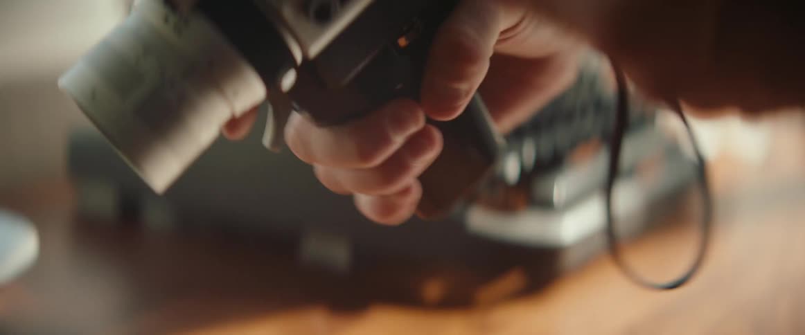 Man looking through a vintage device
