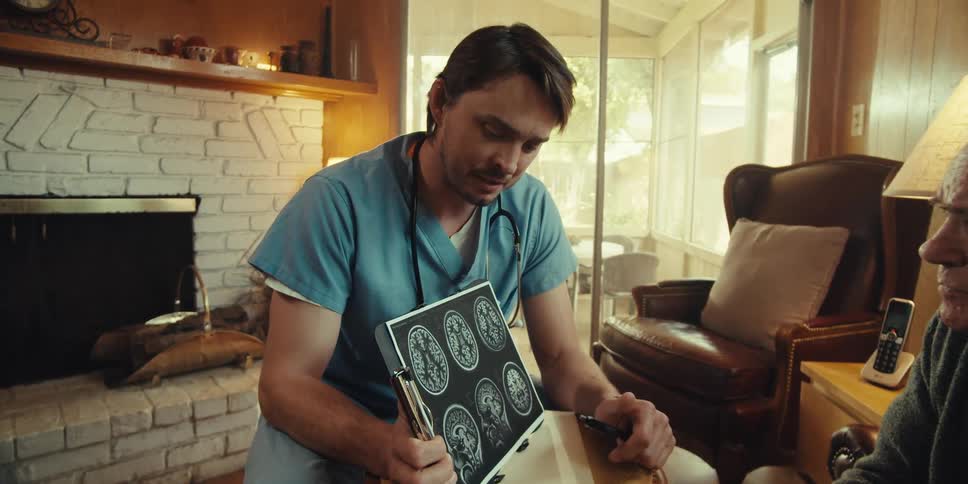 A footage of a doctor making an explanation to an elderly man
