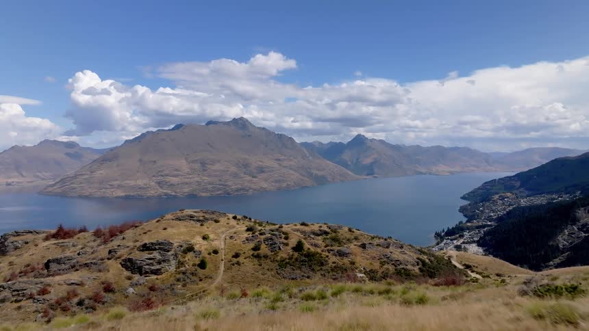 On a hill top overlooking some water