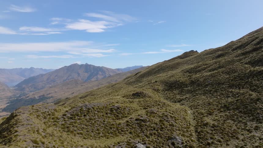 Aerial view of greenish mountain ranges