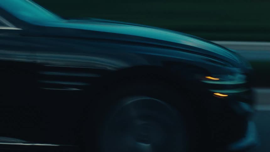 A car speeds on the road