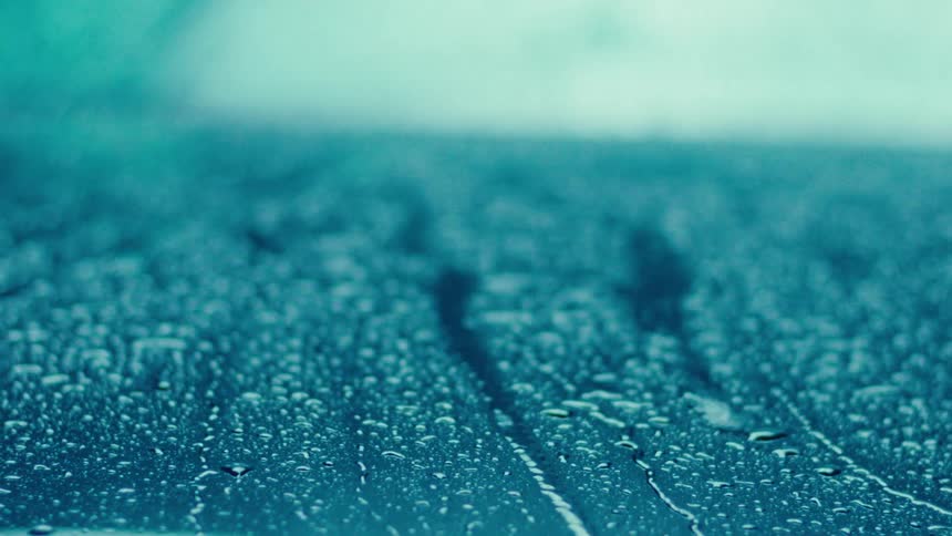 Hard rain falling on a car during a storm