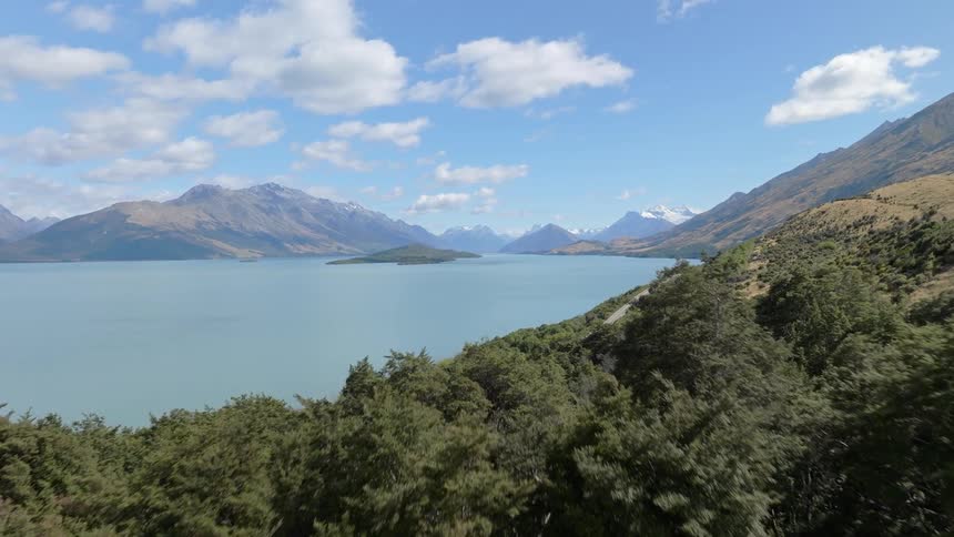 Landscape of a vast lake surrounded by mountains