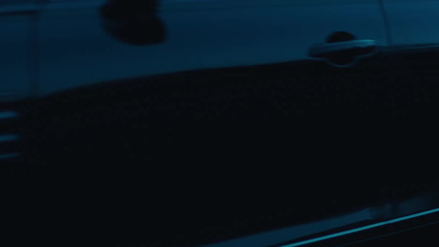 A footage of a car moving at dawn