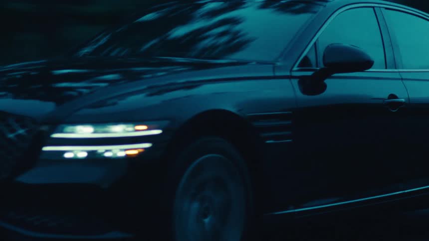Sedan car traveling on a highway