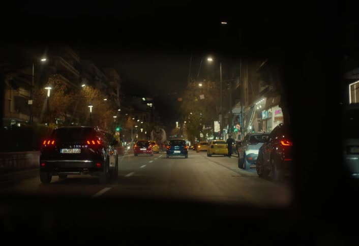 A night footage of a city from a car view