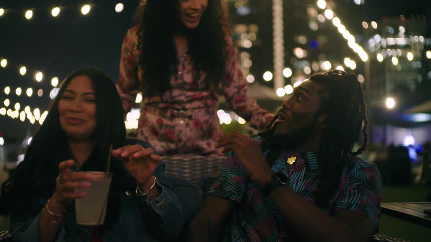 Friends meet up at night and have fun