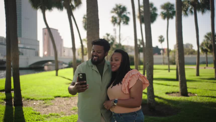 Couple outdoors on a video call on a smartphone