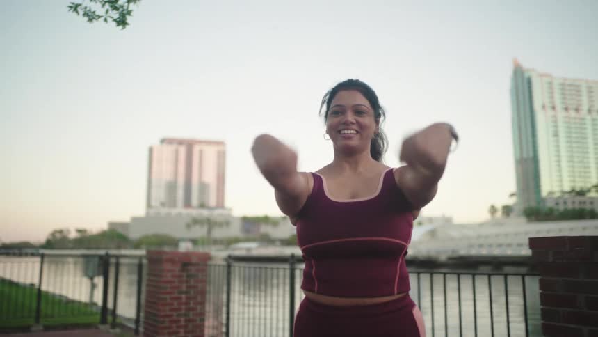 Woman stretching her wrists