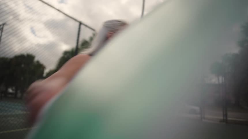 A woman returns the ball during a game