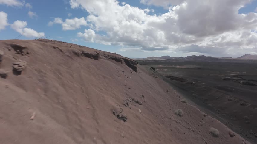 The landscape is covered with brown soil