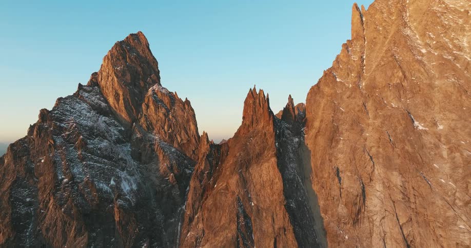 Aerial view of peaks with mountain cliffs