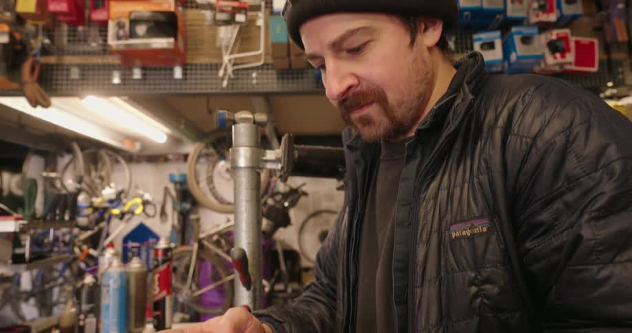 A footage of a man operating a smartphone