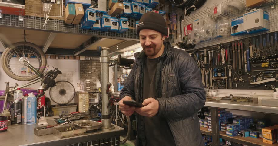 A footage of a person operating a smartphone