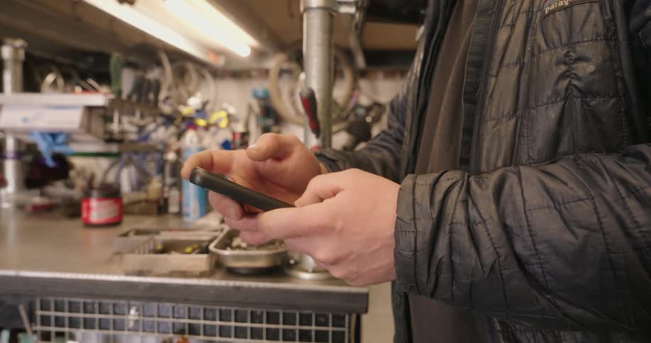 A footage of a person operating a smartphone