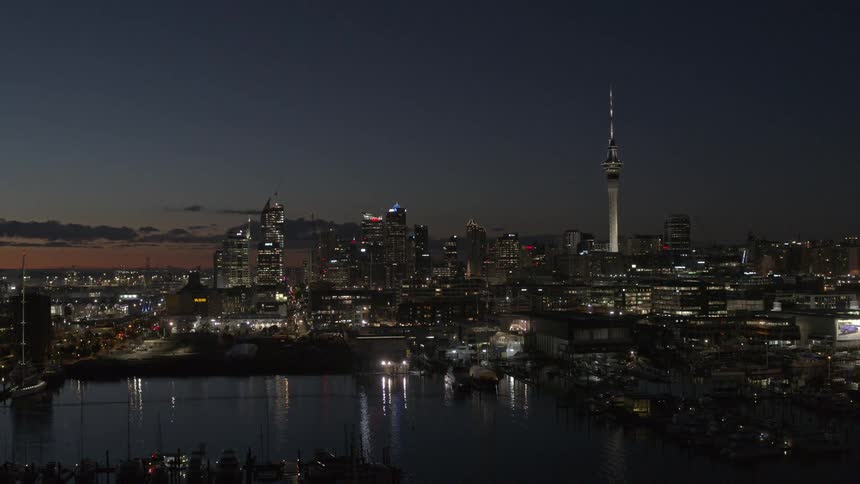 The sun is nearly set on the city