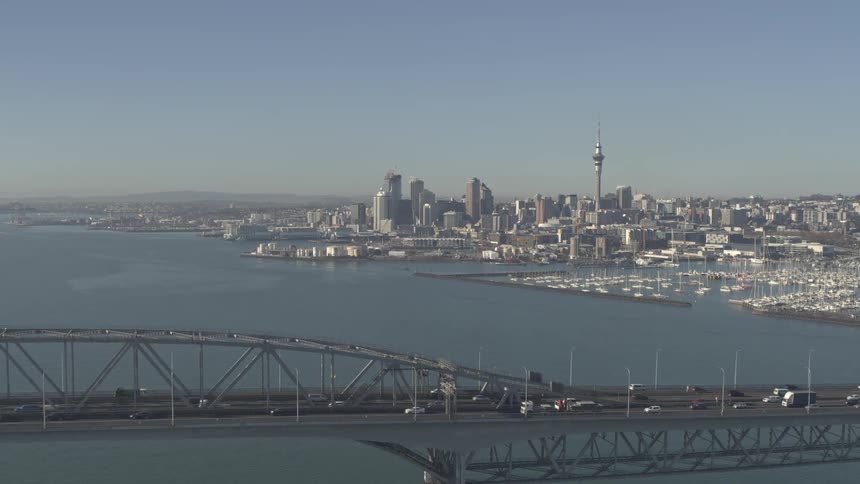 Traffic travels over the bridge on a sunny day