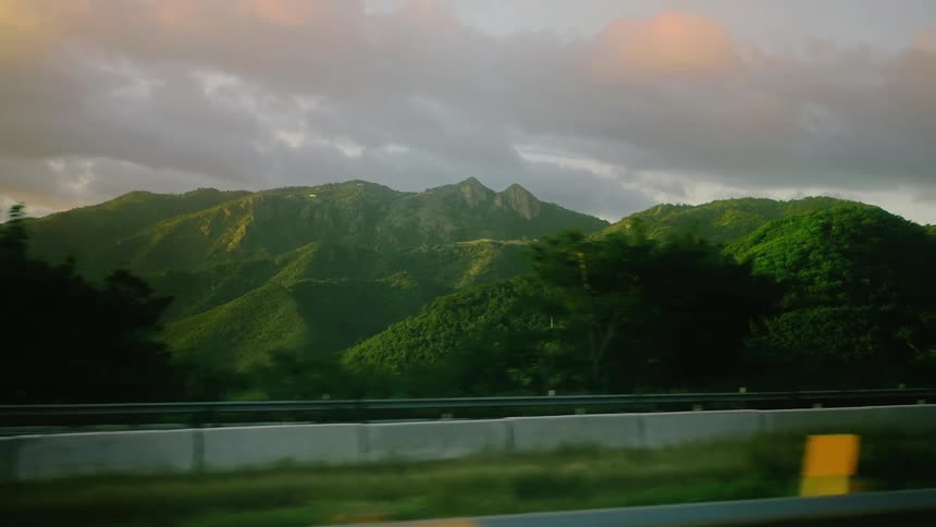Light fog is on the green mountains