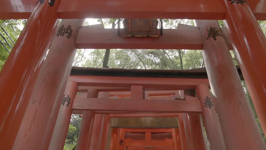 Chinese structure made of red and black wood and posts
