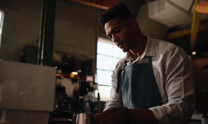 A footage of a man making a coffee