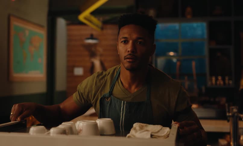 A footage of a man in a coffee shop