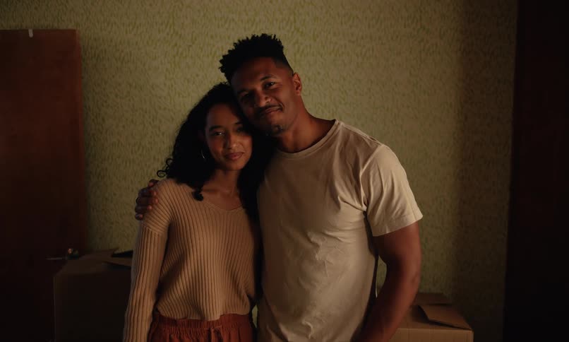 Portrait of a couple hugging with happy facial expression