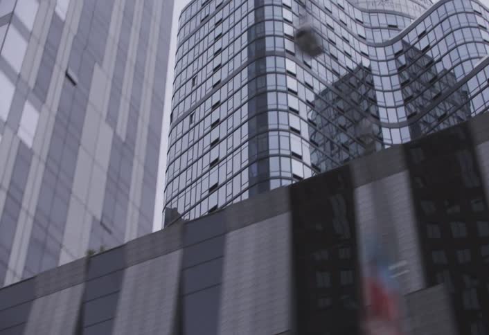 The sky reflects on the buildings