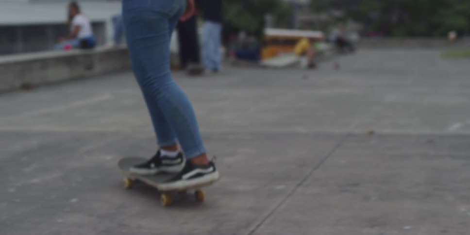 Legs of a woman in a skateboarding performance