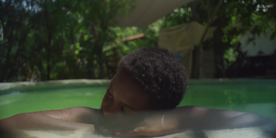 A woman is resting in the pool