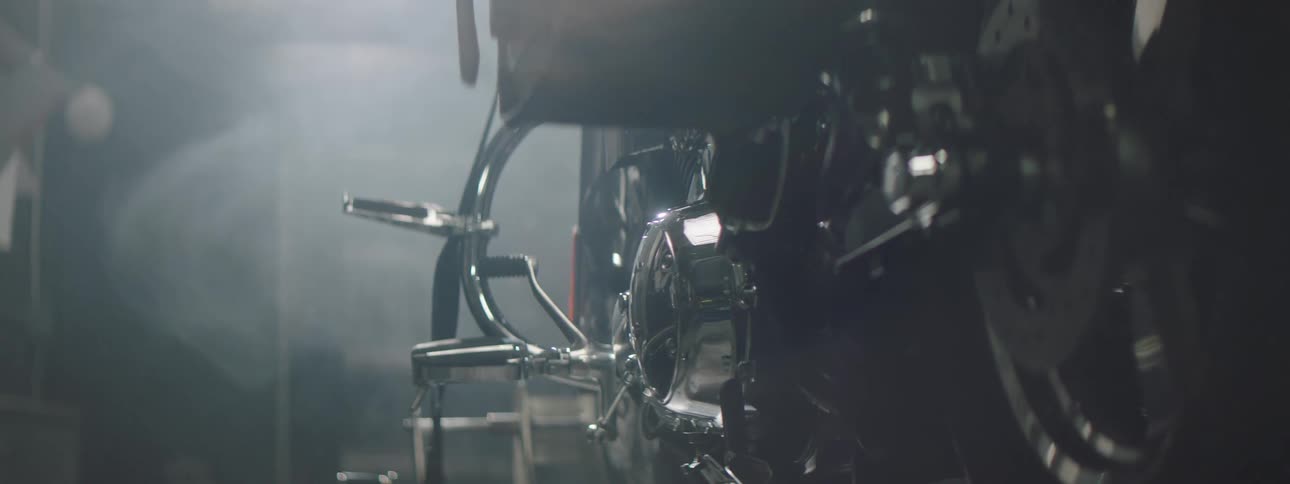 A motorcycle is parked in the garage