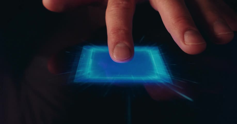 Persons finger pressing a screen displaying a black and blue vortex spiral