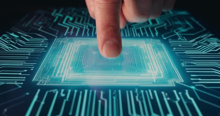 Finger touching a digital surface with blue illuminated circuits