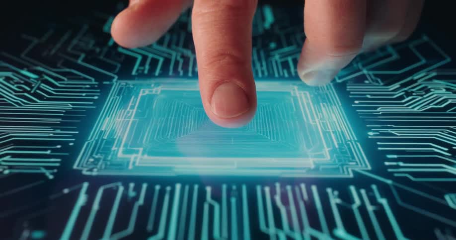 Fingers interacting with a digital surface illuminated by blue circuitry
