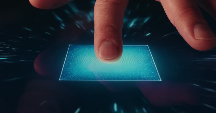 Finger touching a bright rectangular area on a digital screen