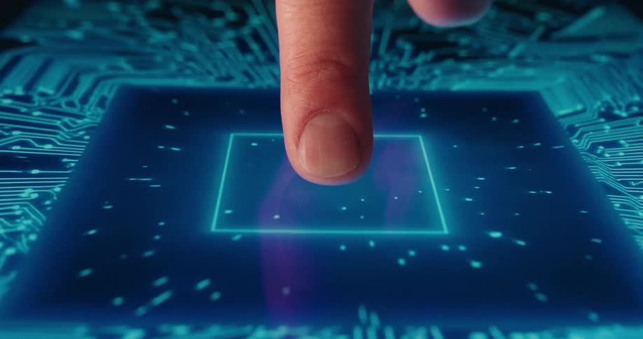 A finger presses a blue square