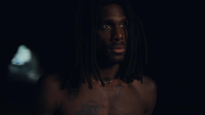 A man with a determined look ready to face whatever lies ahead