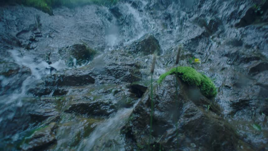 Water running down a mountain in a waterfall