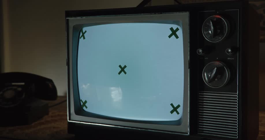 The television is flickering by the phone
