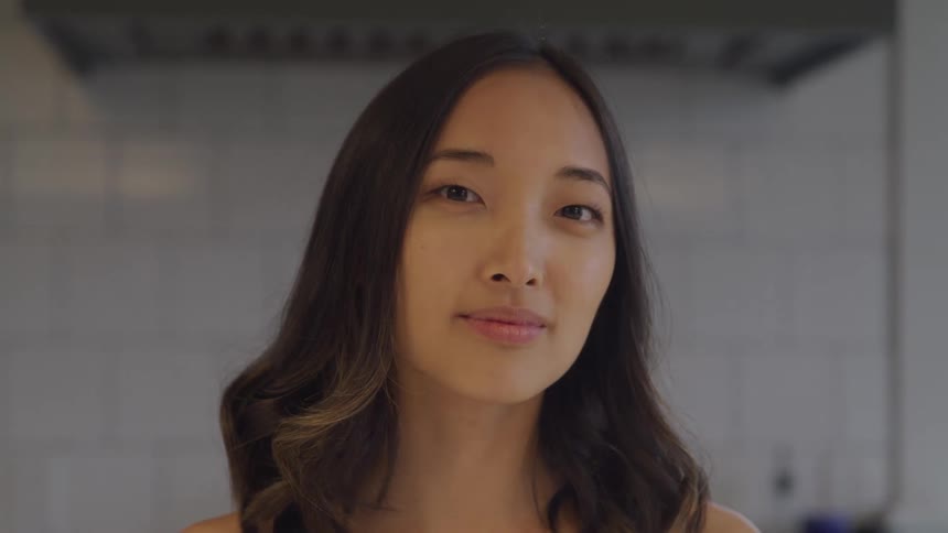 Portrait of a young woman in an indoor space