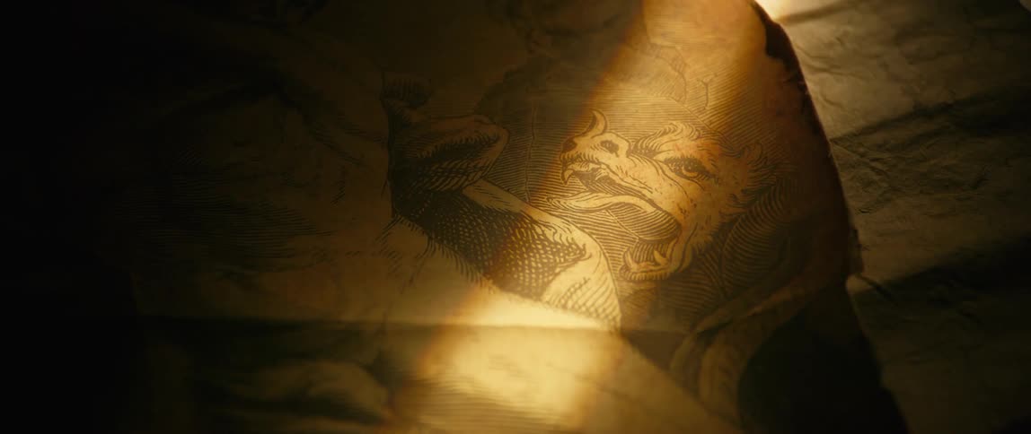 A beam of light is on the painting