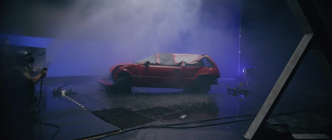 A footage of a car in the studio