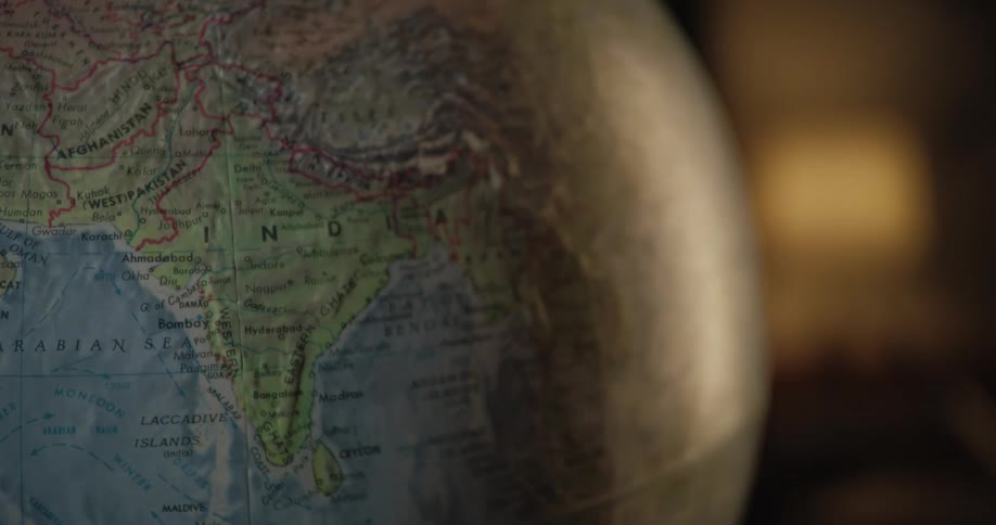 Light reflects on the world globe
