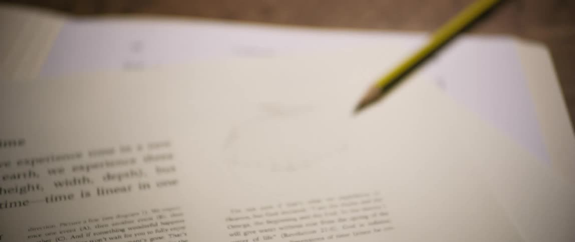 Pencil moving on a document with student questions