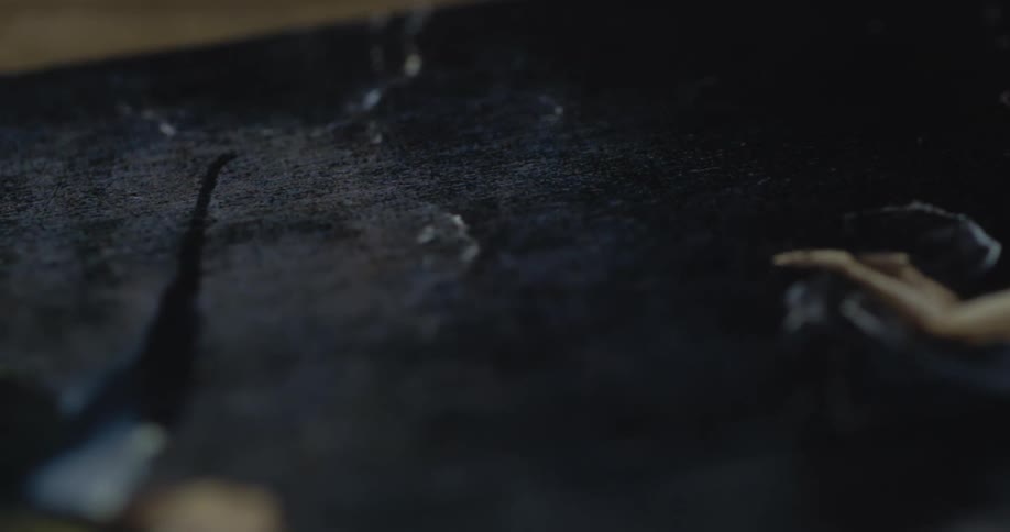 A painting is sitting in the dark