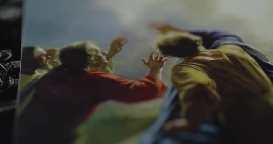 The painting comes into focus as the light hits it