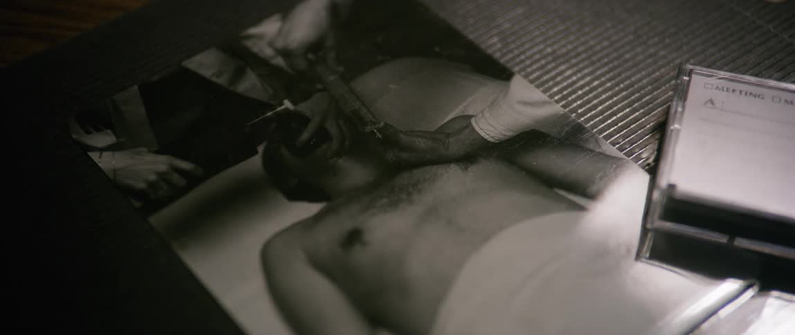 Close up of an abstract photograph of a person lying down without a shirt