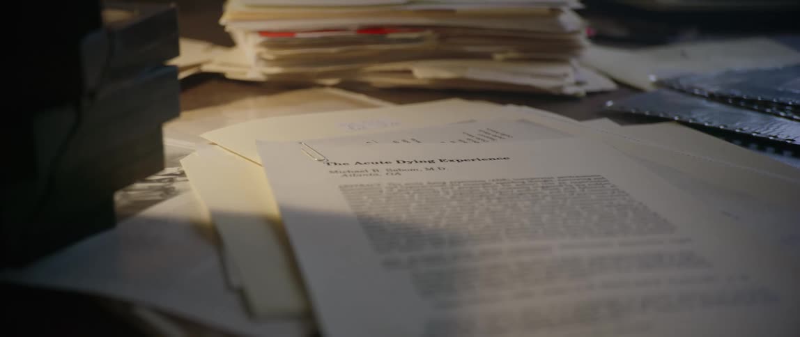 The desk is full of paperwork