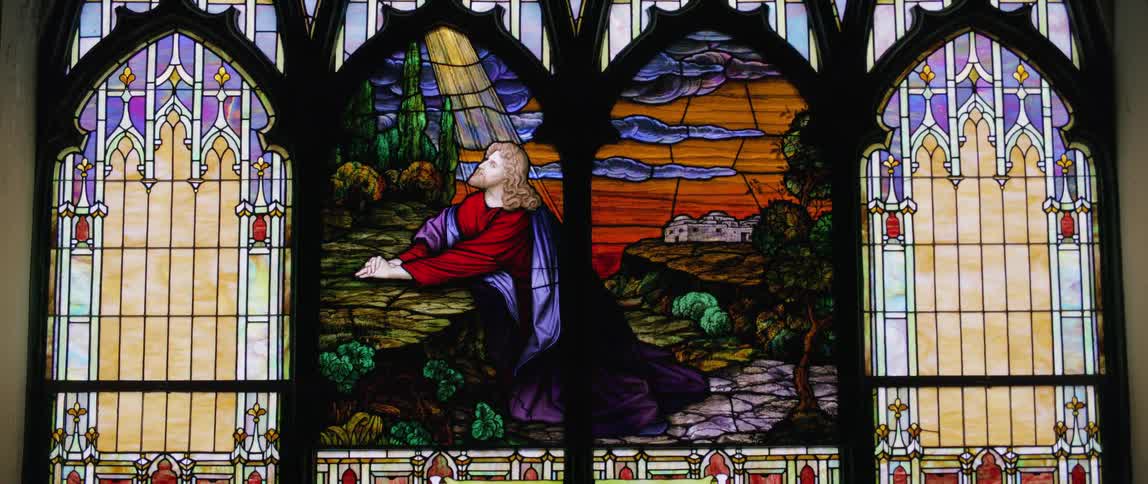 Stained glass art of jesus christ on a church windows