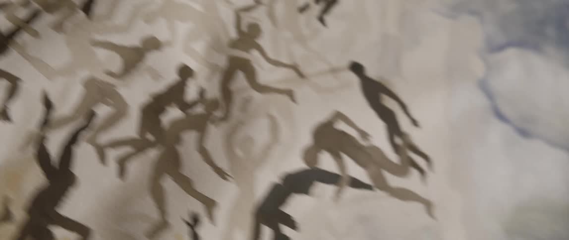 Fabric showing silhouettes of men and women in different poses to demonstrate dancing